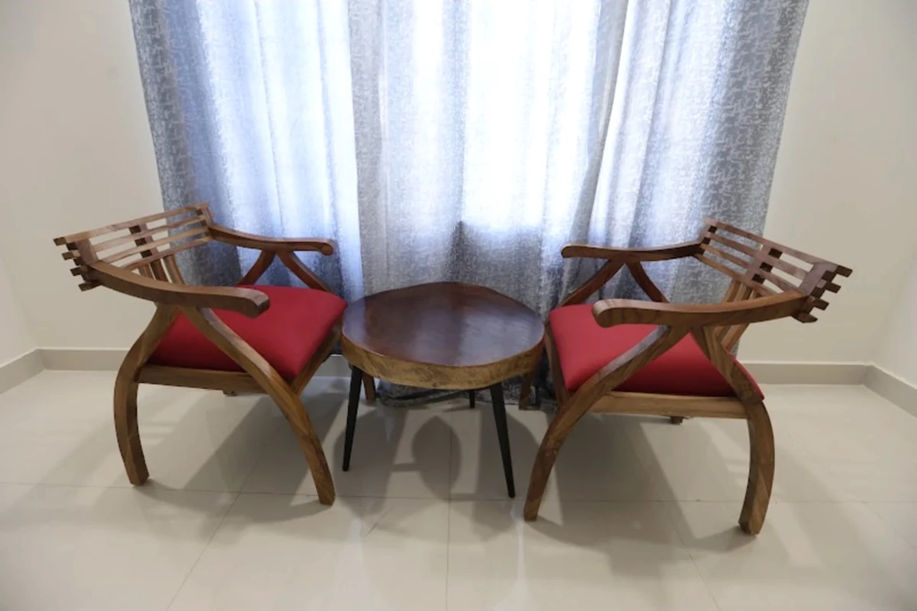 Indoor seating area with two chairs and a table at Silver Oak Estate
